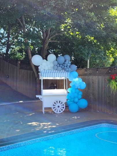 gradient balloon garland dark blue light blue pastel blue grey poolside candy cart dessert cart