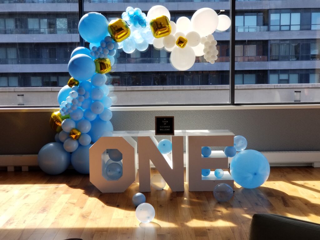 one table gradient blue balloon garland gold balloons blue white balloons backdrop