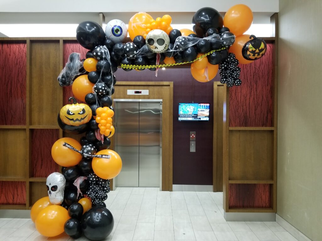Halloween balloon garland spiders ghosts orange black balloons eyeballs zombies pumpkin crime scene cobwebs