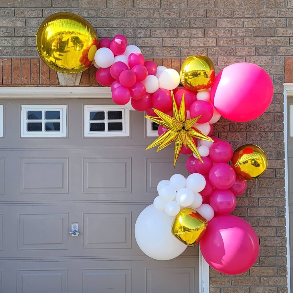 pink balloon garland gold white and pink balloons