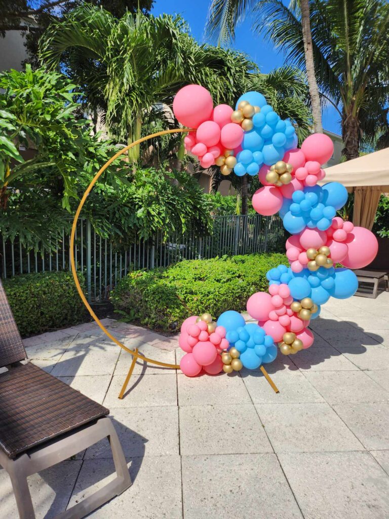Florida gender reveal balloons pink blue gold ring 